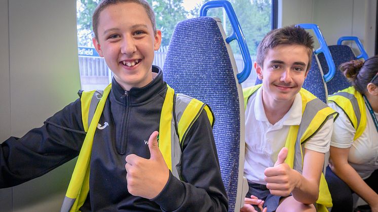 Enjoying the Thameslink trip are two students both named Joshua