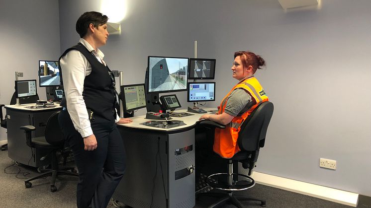 Polly McGillivray and Laura McDonald training on the sim desk