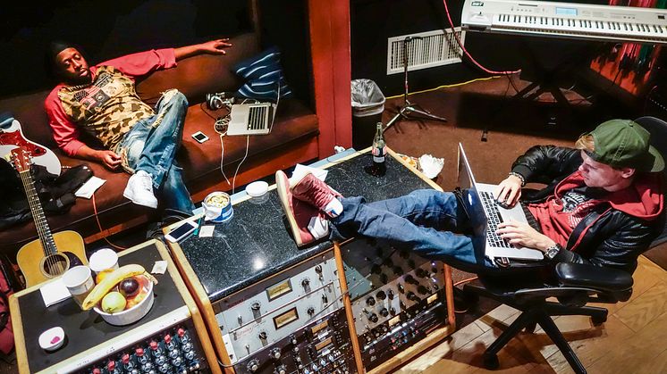 Tim “Avicii” Bergling in the studio with Wyclef Jean