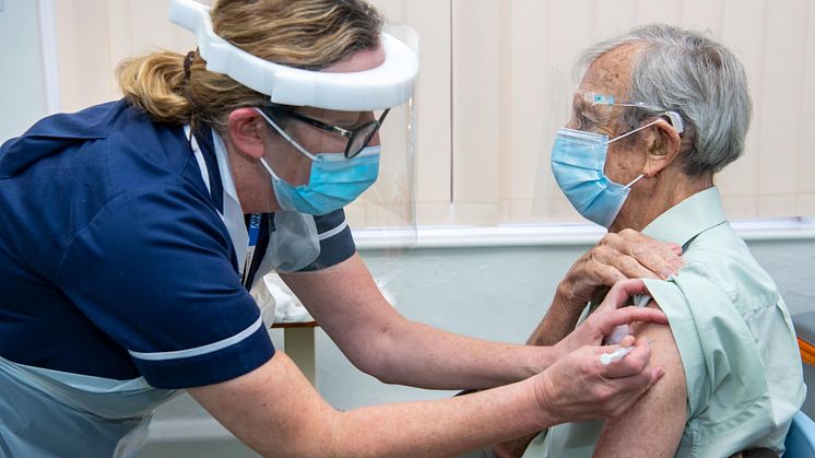 Leslie Berkeley receives his Covid vaccination from Practice Nurse Amanda Williams.