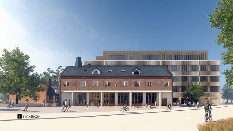 Hägerstensborna känner igen den typiska brandstationsfronten mot gatukorsningen. I bakgrunden reser sig den nästan kubformade nybyggnationen. Bild: Tengbom Arkitekter