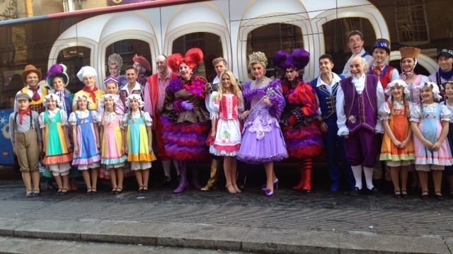 The cast from Cinderella in front of Go North East's magical panto bus