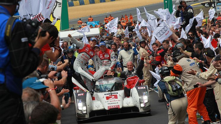 The Audi R18 e-tron quattro #2 wins the 2014 Le Mans 24h with Marcel Fässler, André Lotterer, Benoît Tréluyer