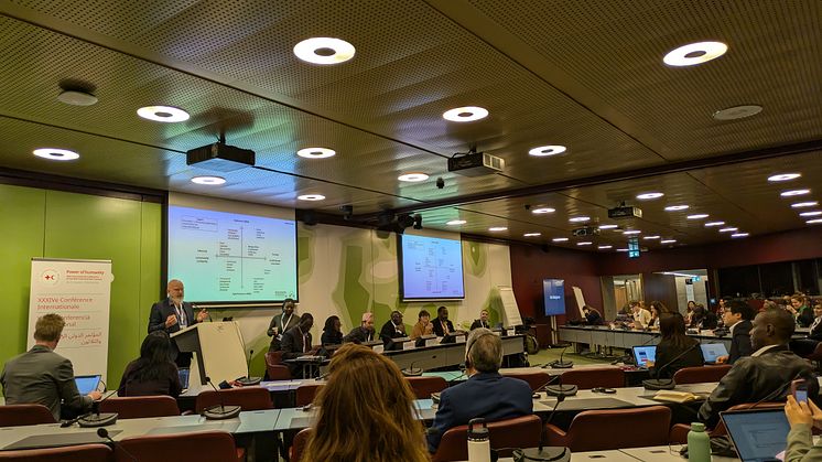 Professor Matt Baillie Smith speaking in Geneva at the International Conference of the Red Cross and Red Crescent.