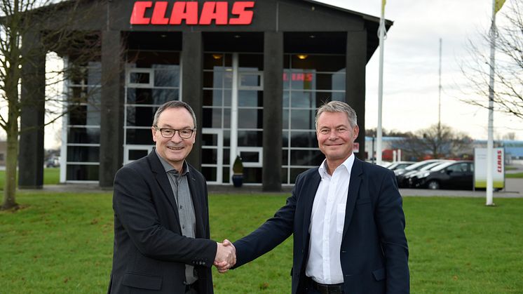 Sten Andersen, Agromeks formand, tv., og Michael Husfeldt, administrerende direktør i Danish Agro Machinery A/S, glæder sig begge over, at der også i 2018 vil være CLAAS maskiner på Agromek. Foto: Wiegaarden.