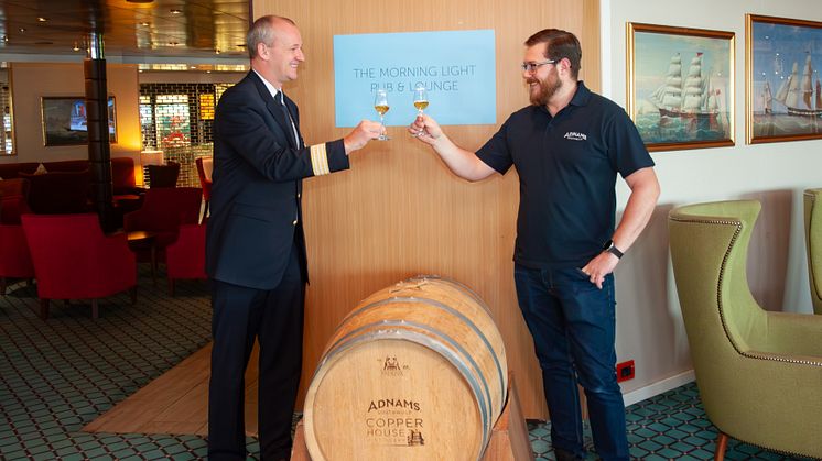 Adnams' Bradley Adnams with Fred. Olsen Cruise Lines Hotel Manager Iain Gibson