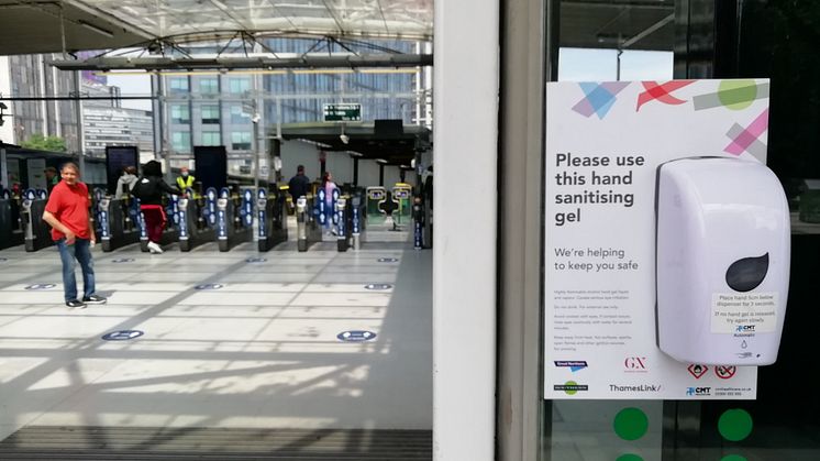 Social distancing at East Croydon station - hand sanitiser