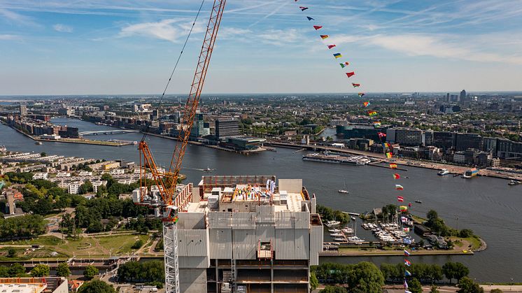 34 flags for 34 nations which work together on the construction site in Amsterdam North.