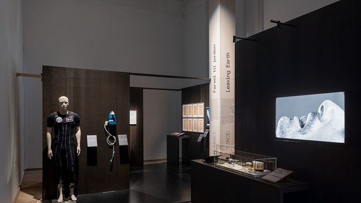 Skinsuit from European Space Agency, 2015. Measuring device from Danish Aerospace Company A/S, 2015-19. Konstantin E. Tsiolovsky, Album of Cosmic Journeys, 1932. Ralo Mayer, Un-Earthing (pharmakon), 2021