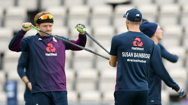 Ollie Pope and Mark Wood of England warm up displaying key workers names on their backs ahead of day one of the 1st #RaiseTheBat Test match at The Ageas Bowl on July 08, 2020 in Southampton, England. (Photo by Stu Forster/Getty Images for ECB)