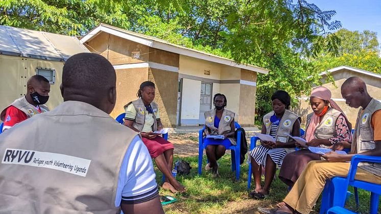 Members of the research team in Nakivale, Uganda, supporting Photovoice activity. Photo by Robert Turyamureeba