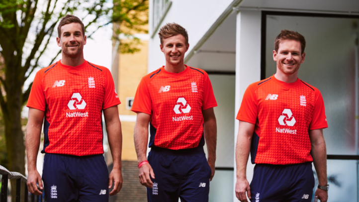 Dawid Malan (left), Joe Root and captain Eoin Morgan model England’s red shirt they will wear against Scotland