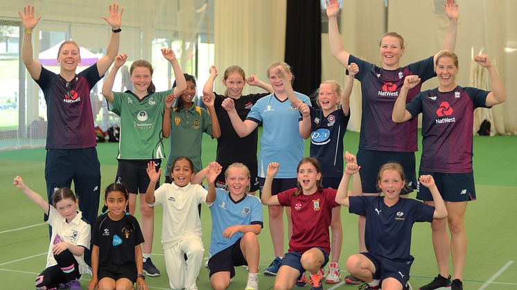 Members of the England cricket team enjoy a day's training with 11 lucky competition winners as part of Heather's Pride