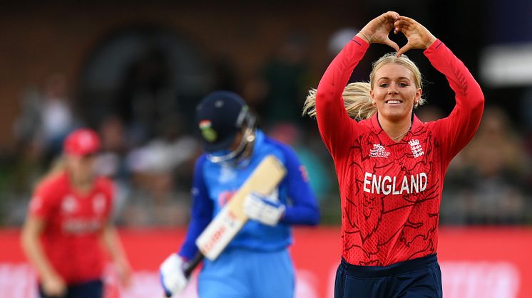 Sarah Glenn celebrates taking one of her two wickets
