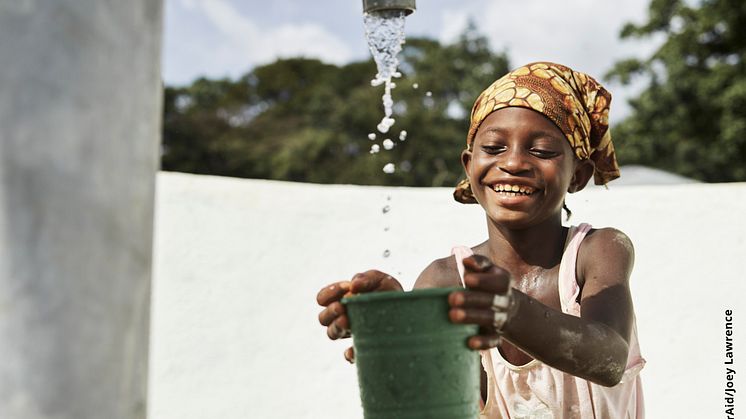 This is Matta. She comes from the village of Tombohuaun in Sierra Leone. Until just a couple of years ago she collected her drinking water from a dirty pool in the forest. Today, Matta, her family and others in the village have access to clean water.
