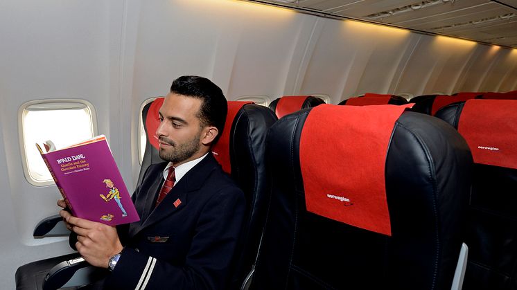 Norwegian crew reading Charlie and the Chocolate Factory by Roald Dahl
