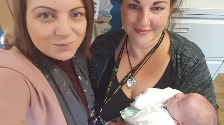 Victoria with her new daughter and her stop smoking advisor Sharon Hall.