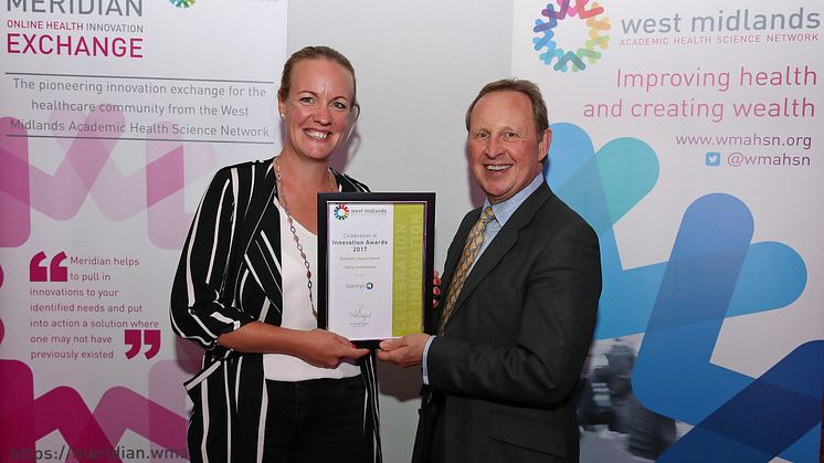 Georgina Horton, PR and Marketing Executive at Isansys, collecting the award at the Celebration of Innovation Awards 2017