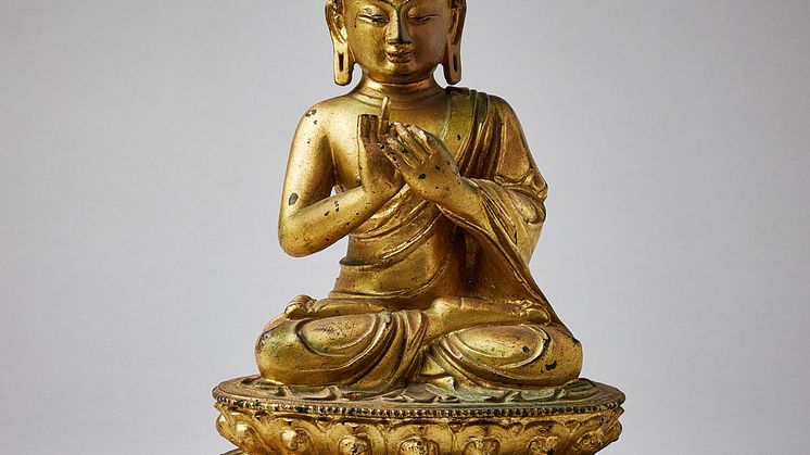 A Cold Gold Paste Bronze Figure of Buddha Dipankara
