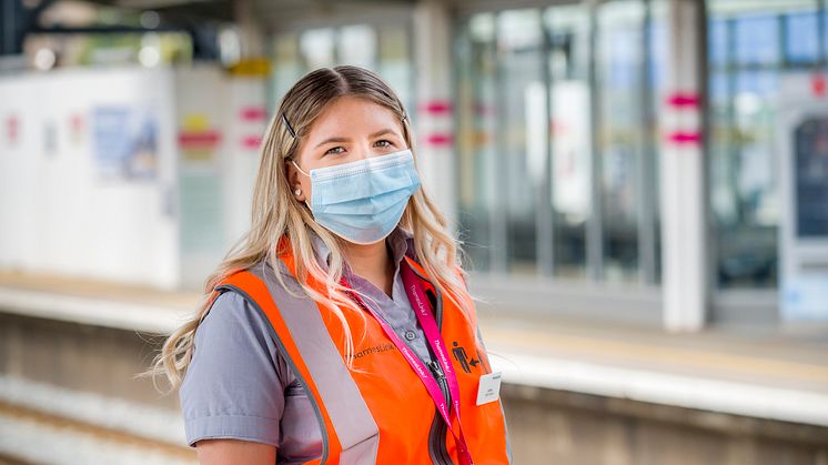 Station Assistant Jovana is reminding customers to sanitise hands before and after every journey