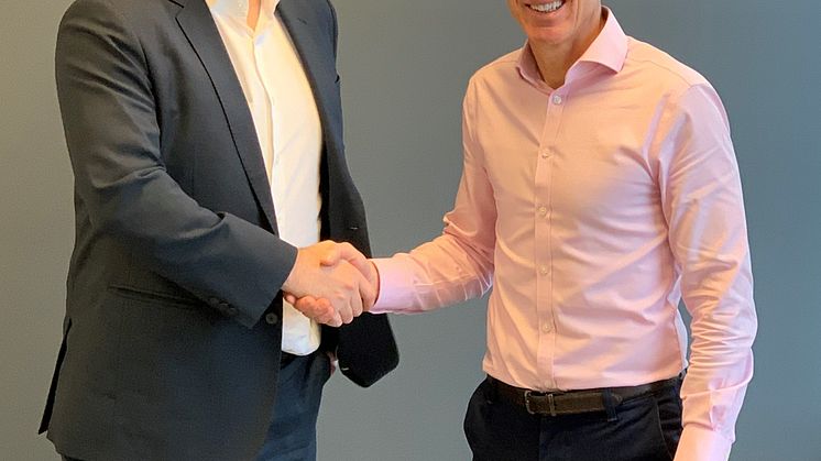 Nicholas Bourque, President of Marine Press (left) and Martin Taylor, Chief Executive Officer of ChartCo (right)