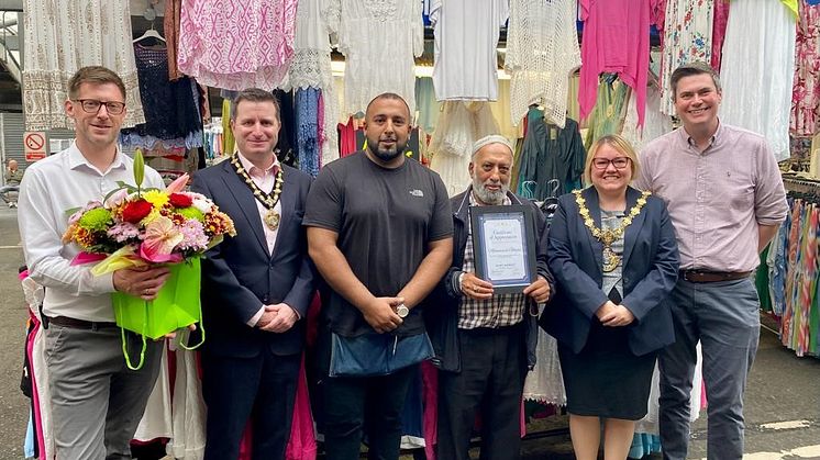 Mohammed Ghyas is presented with gifts by the Mayor of Bury on his 50th anniversary of trading on Bury Market. Also pictured is his son Waqas, the mayor’s consort James Bentley, and market managers Simon Green and David Catterall.