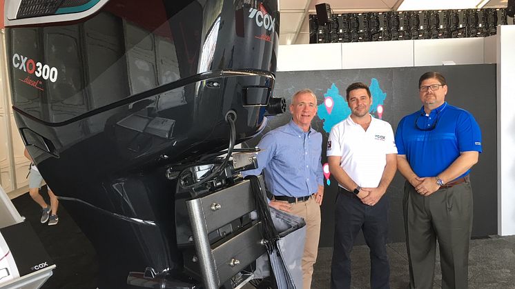 Joel Reid, Global Sales Director at Cox Powertrain (middle) with Rick Chapman, Marine Engine Consultant (far left) and  Keith Moore Vice President, New Engine Business Manager (far right) at Ring Power Coporation