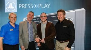 JL Audio UK' s Paul Baker and Mark Baker accepting the 'Marine Distributor of the Year Award' from JL Audio's George Jenkins (left) and Andy Oxenhorn, President JL Audio Inc. (right)