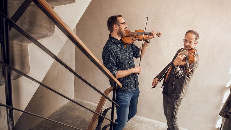 Daniel Kuzmin och Yannick Dondelinger