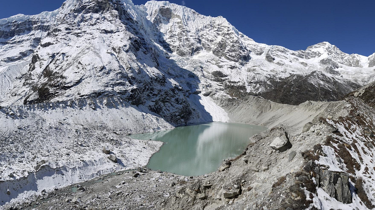 Dig Tsho glacial lake in the Langmoche valley, Nepal. The natural moraine dam impounding this lake breached catastrophically in 1985, causing extensive damage downstream.