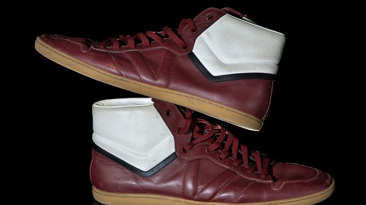 A Pair of Louis Vuitton Burgundy Sneakers