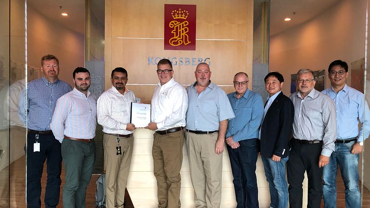 The KONGSBERG and Tidewater Marine Project Team celebrate the signing of their landmark contract at Kongsberg Maritime’s Singapore headquarters