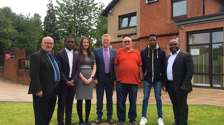 ng homes CEO Robert Tamburrini, Gervais Hameni, HR Officer Olivia Friary, Depute Director (Corporate Services) Tony Sweeney, Chair John Thorburn, Yvan Mbadjou and African Challenge Scotland Founder Ronier Deumeni