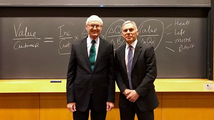 Michael Porter, Harvard Professor and Founder of Shared Value with Adrian Gore, Discovery Chief Executive.
