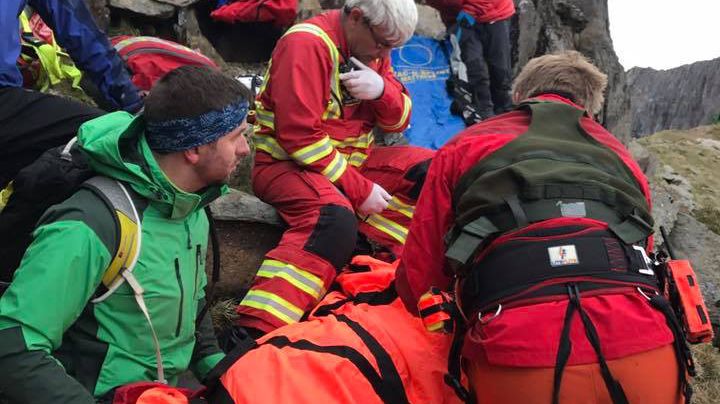 Medics attend to the woman hiker in her thirties who fell on Crib Goch ridge. Photo: Simon Duringer