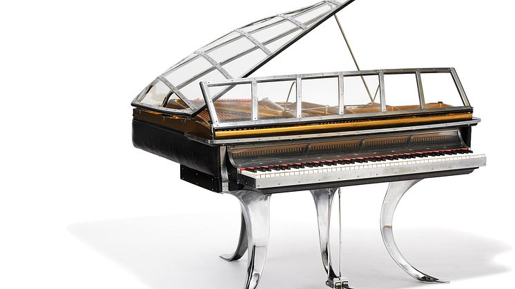 Poul Henningsen: "PH Grand Piano". Black stained wood, chrome steel and edge covered with black leather. Sold for: DKK 2,450,000 (EUR 430,000 including buyer’s premium).