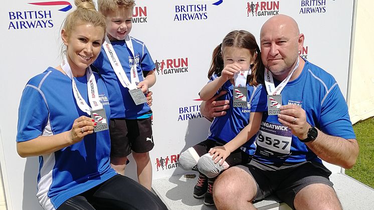 Crawley dad James Loye pictured with his family after a run - more pictures available to download below