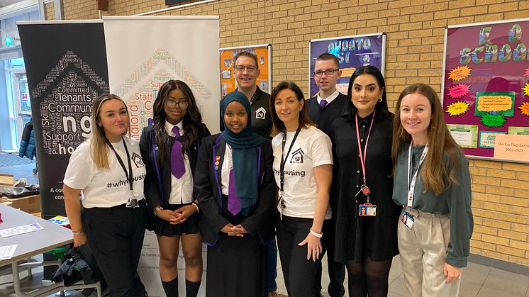 ng homes staff gather with staff and students from All Saints Secondary at their careers morning