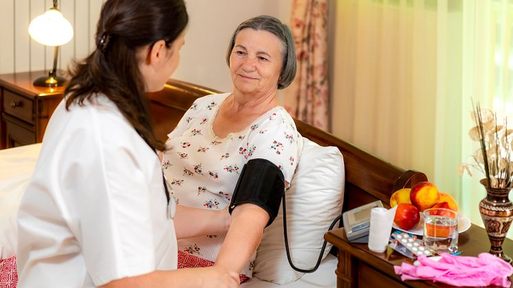 30038176-doctor-checking-blood-pressure-to-senior-woman