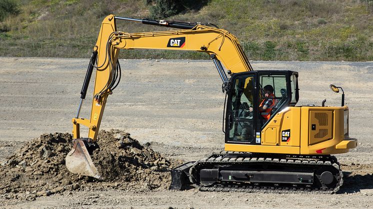 Cat 310 Next generation, vy från sidan.