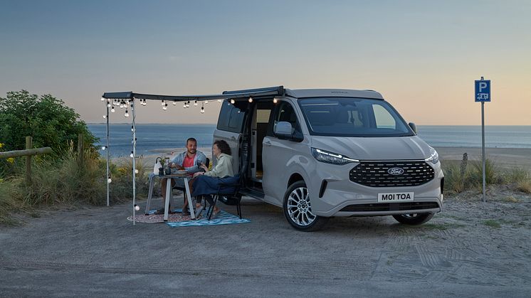 2024FordTransitNuggetLWBTitanium_2_3-4_front_awning.jpg