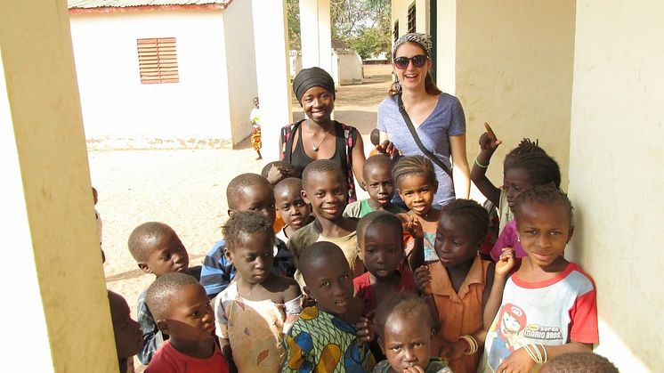 Rebecca Richardson (back right), Research Fellow in Communication Aspects of Infectious Disease Risk Reduction at Northumbria University, Newcastle, carrying out research in Nairobi
