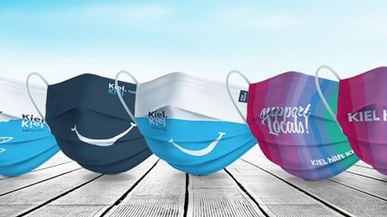 Auch mit Maske immer ein Lächeln im Gesicht. Kiel.Sailing.City und Kiel hilft Kiel verschönern die Schutzmaßnahmen