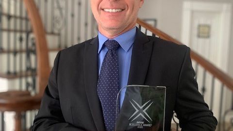 Arnt-Helge Olsen, VP Subsea Sales, receives the prize on behalf on Kongsberg Maritime