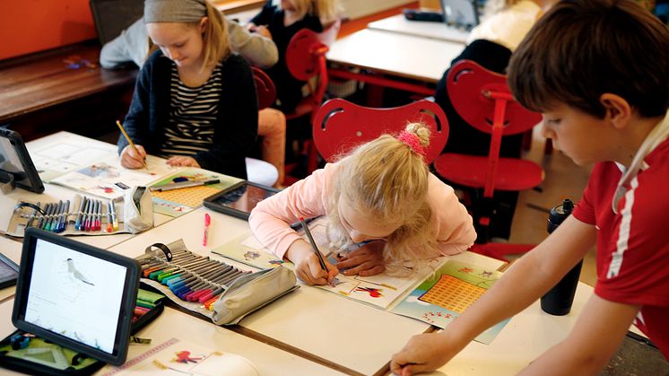 Skolebørn på arbejde