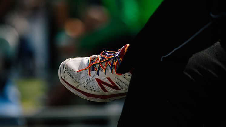 A cricketer with the Rainbow Laces in their spikes. Photo: Tom Shaw/ECB Images
