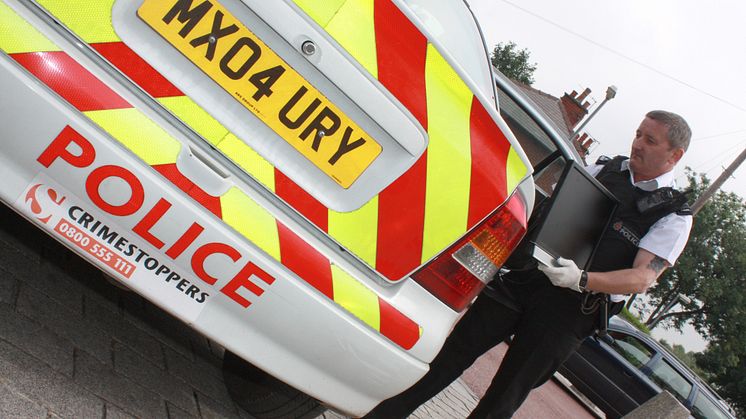 A man was knocked unconscious as he was robbed in Holcombe Brook. 