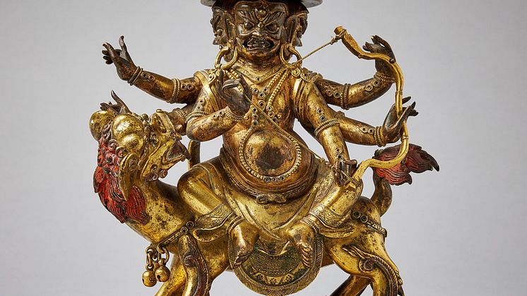 A Tibeto-Chinese gilt bronze figure of Pehar