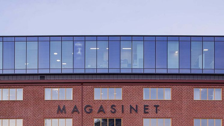 Advania samlokaliserar till Wihlborgs moderniserade magasinsbyggnad i Nyhamnen 
