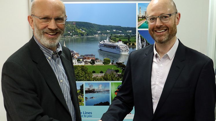 Managing Director Mike Rodwell (l) congratulating new Sales and Marketing Director Justin Stanton (r)